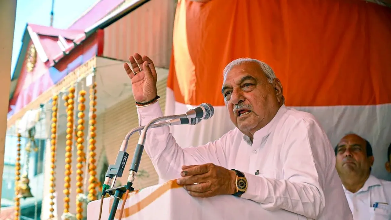 Congress leader Bhupinder Singh Hooda addresses a public meeting in support of party candidate Anand Sharma for Lok Sabha polls at Sihunta, in Chamba, Himachal Pradesh