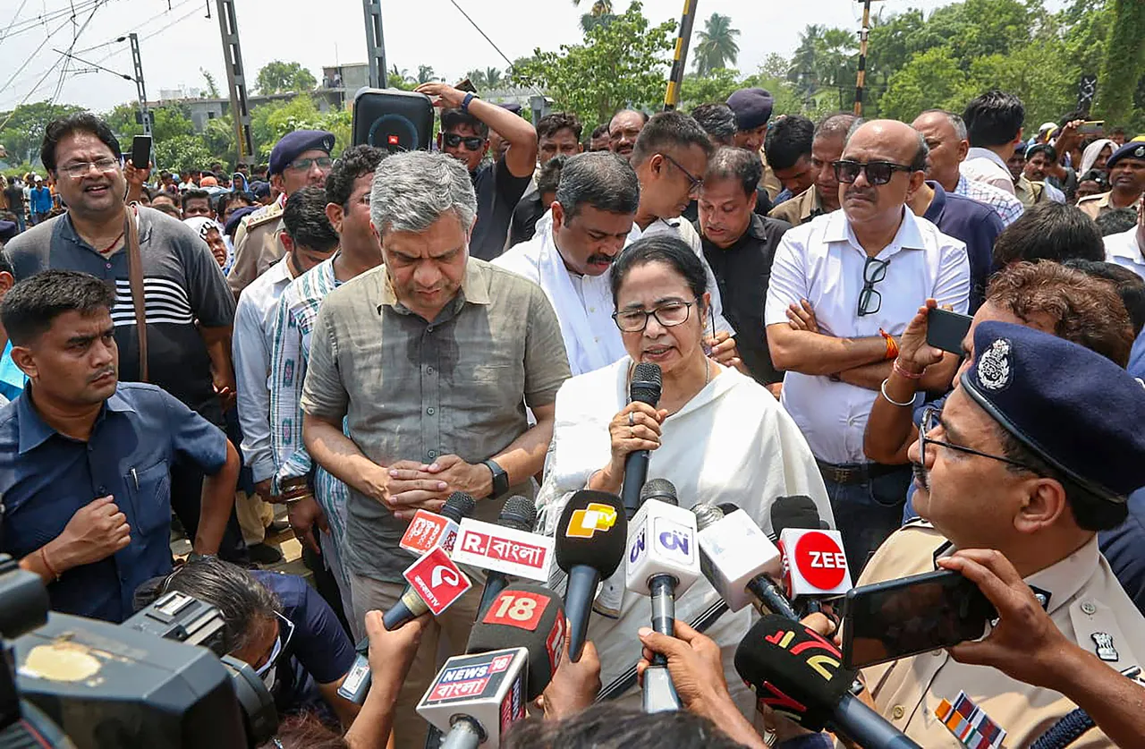 West Bengal Chief Minister Mamata Banerjee talks to the media after visiting the site of the accident