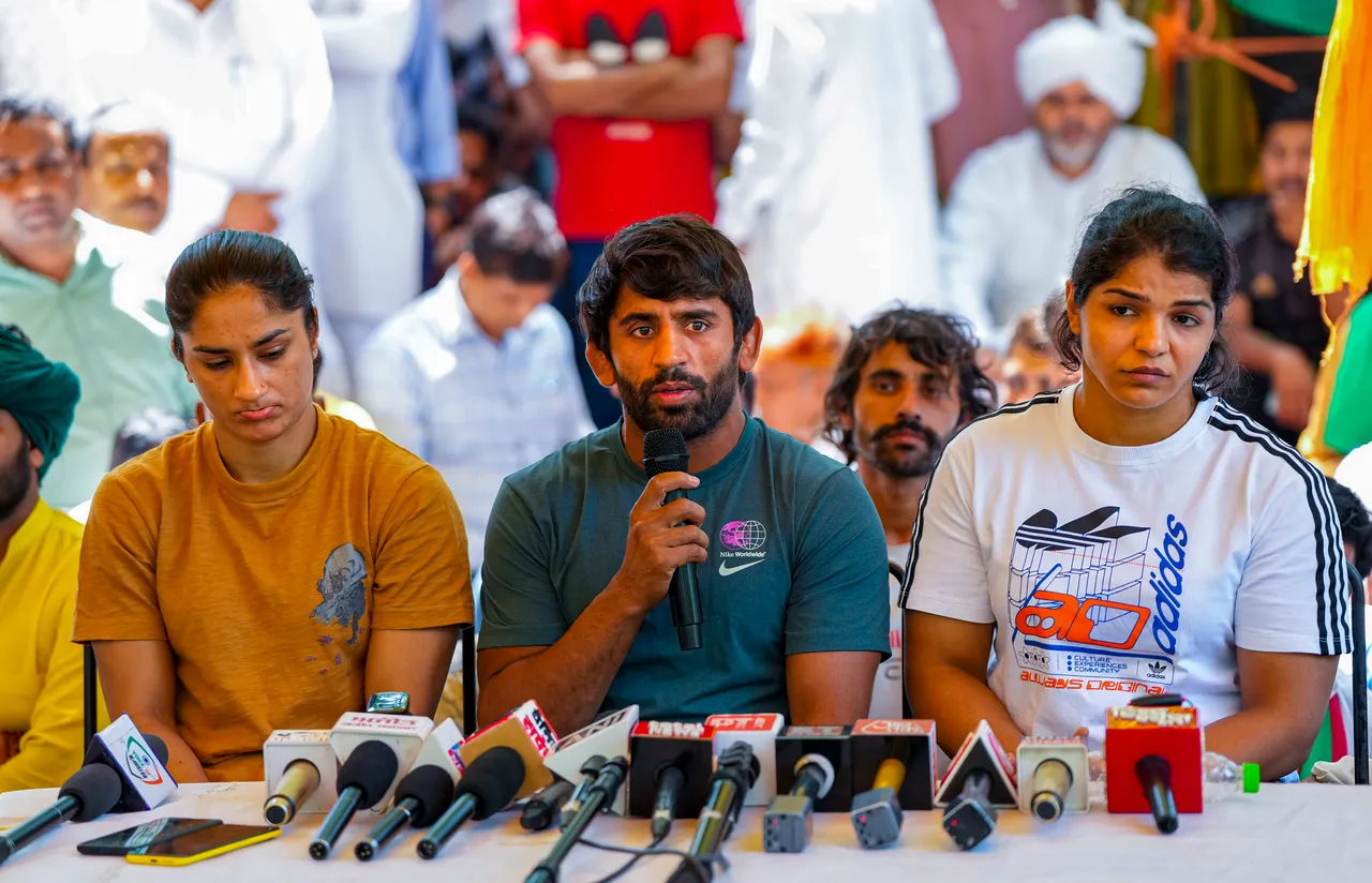  Wrestlers Bajrang Punia, Vinesh Phogat and Sakshi Malik address the media during their ongoing protest against Wrestling Federation of India (WFI) chief Brij Bhushan Sharan Singh, at Jantar Mantar