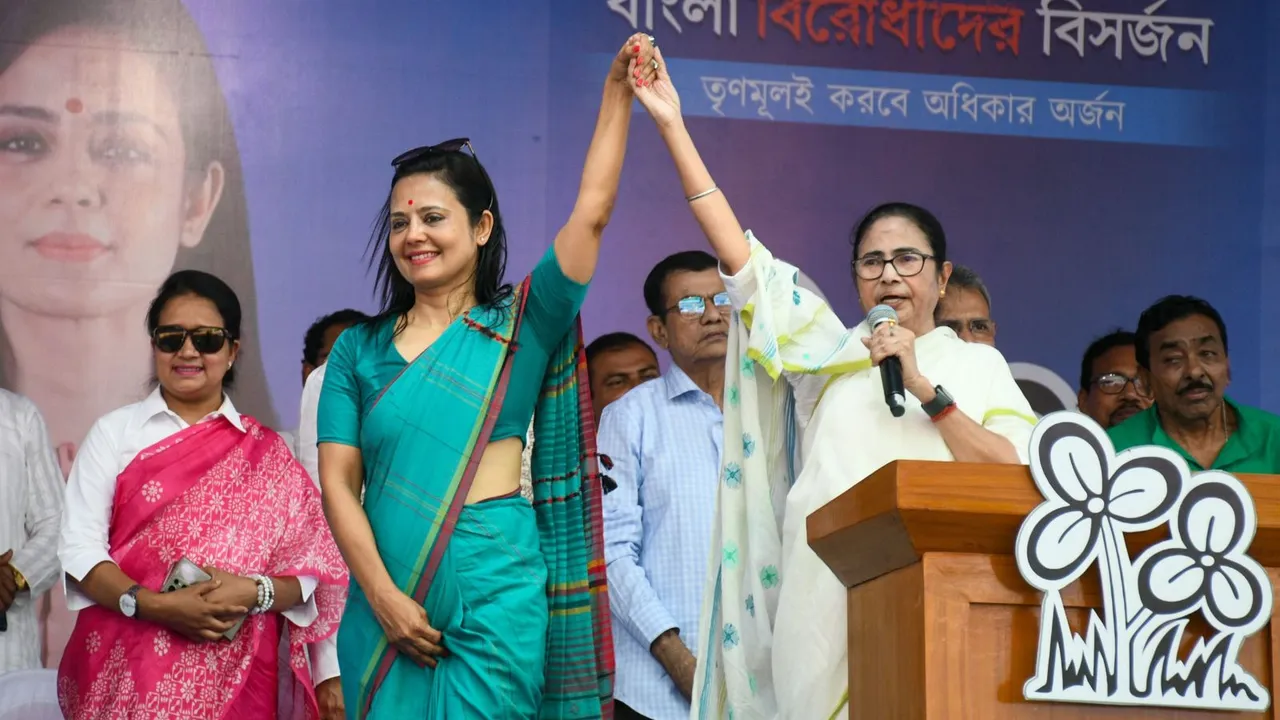 West Bengal CM and TMC chief Mamata Banerjee with party candidate Mahua Moitra at an election rally ahead of Lok Sabha polls, at Dhubuliya, in Nadia