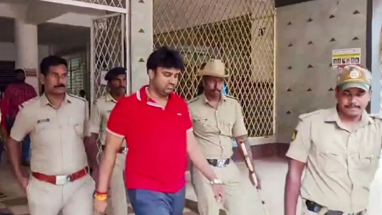JD(S) leader Suraj Revanna, arrested for allegedly sexually abusing a party worker, being taken to custody after his medical check-up, in Hassan, Sunday, June 23, 2024.