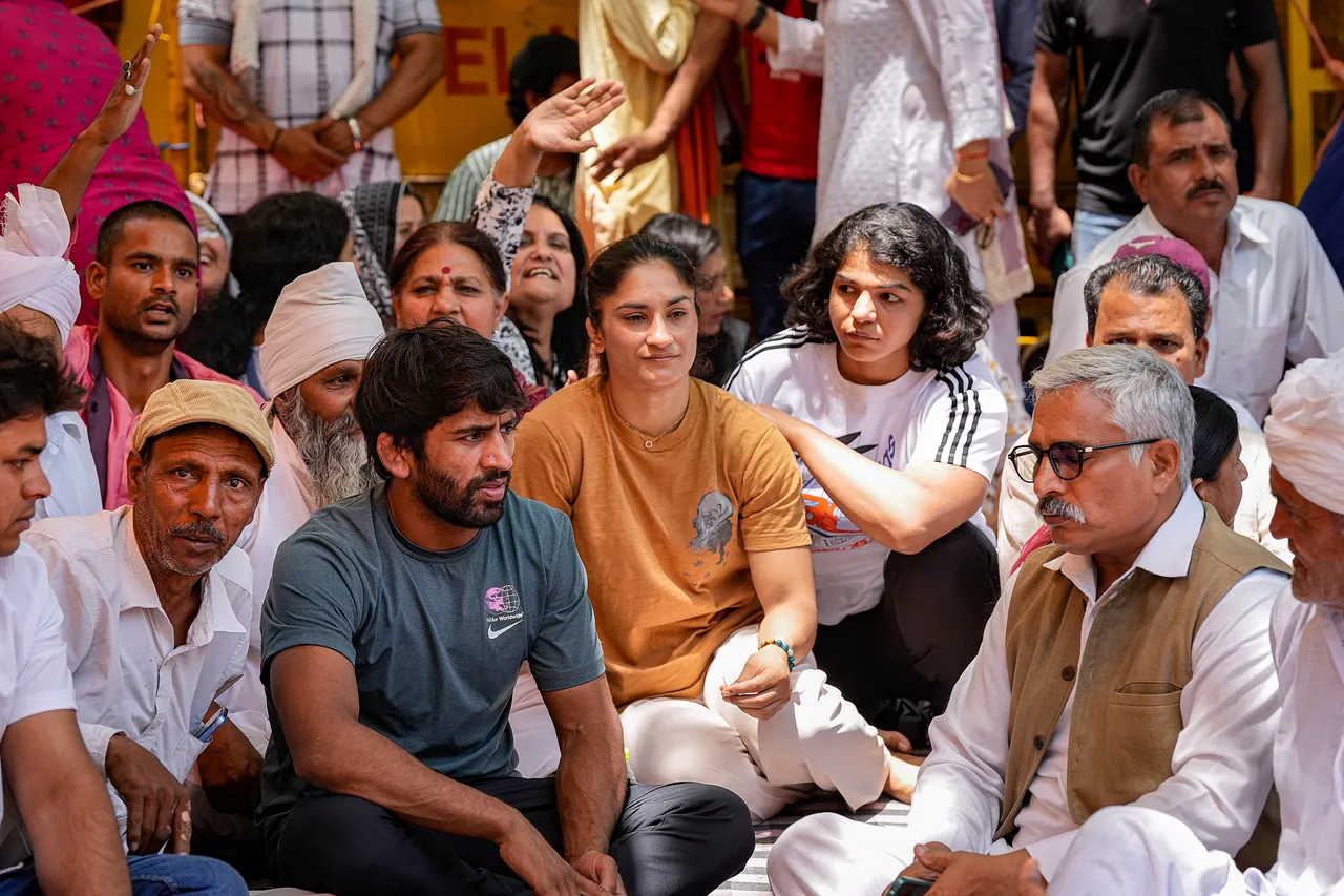 Wrestlers Bajrang Punia, Vinesh Phogat and Sakshi Malik with supporters during their protest against Wrestling Federation of India (WFI) chief Brij Bhushan Sharan Singh, at Jantar Mantar