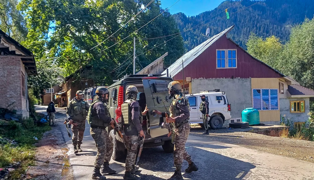  Security personnel during a search operation at Kokernag area, in Anantnag district, Tuesday