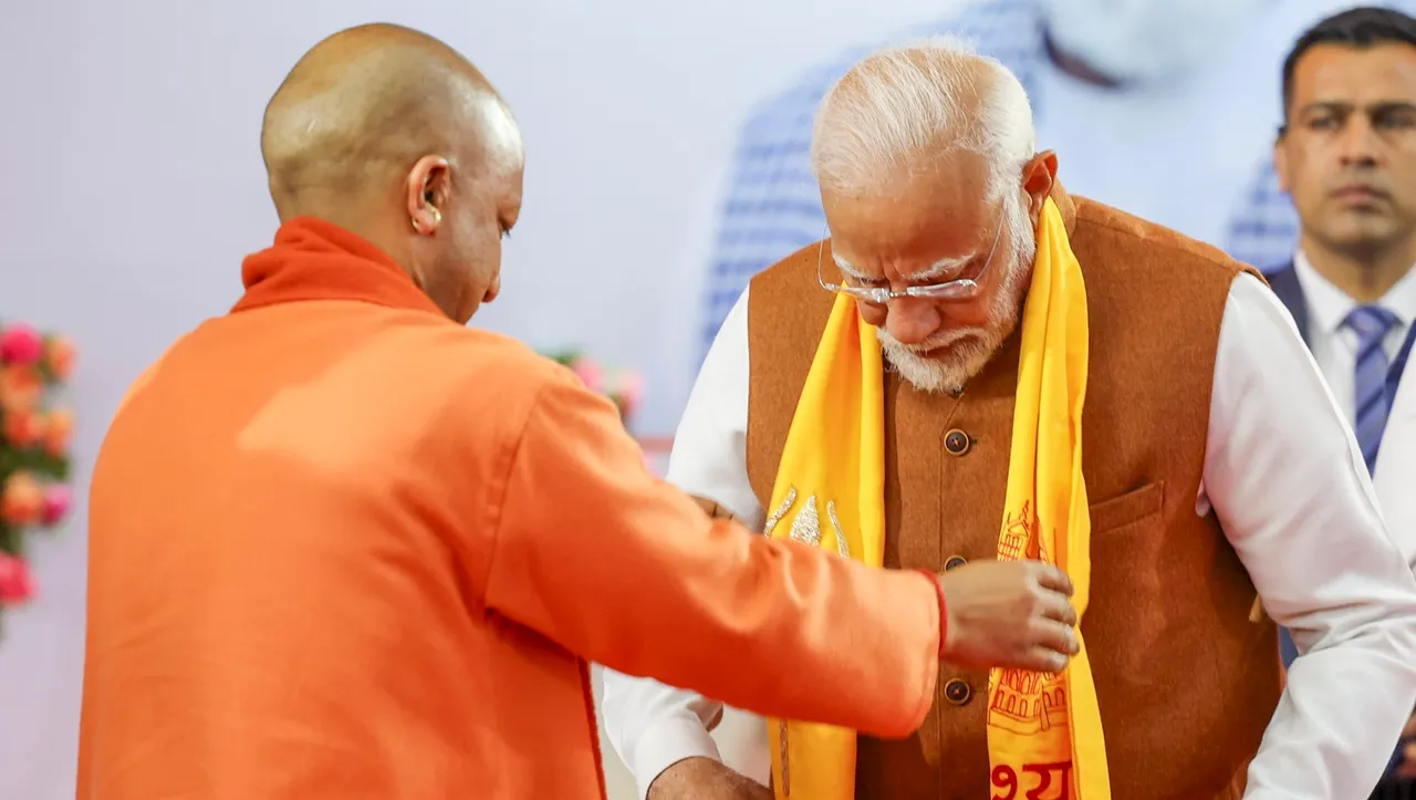 rime Minister Narendra Modi being welcomed by Uttar Pradesh Chief Minister Yogi Adityanath during a prize distribution ceremony at the Banaras Hindu University, in Varanasi, Friday, Feb. 23, 2024.