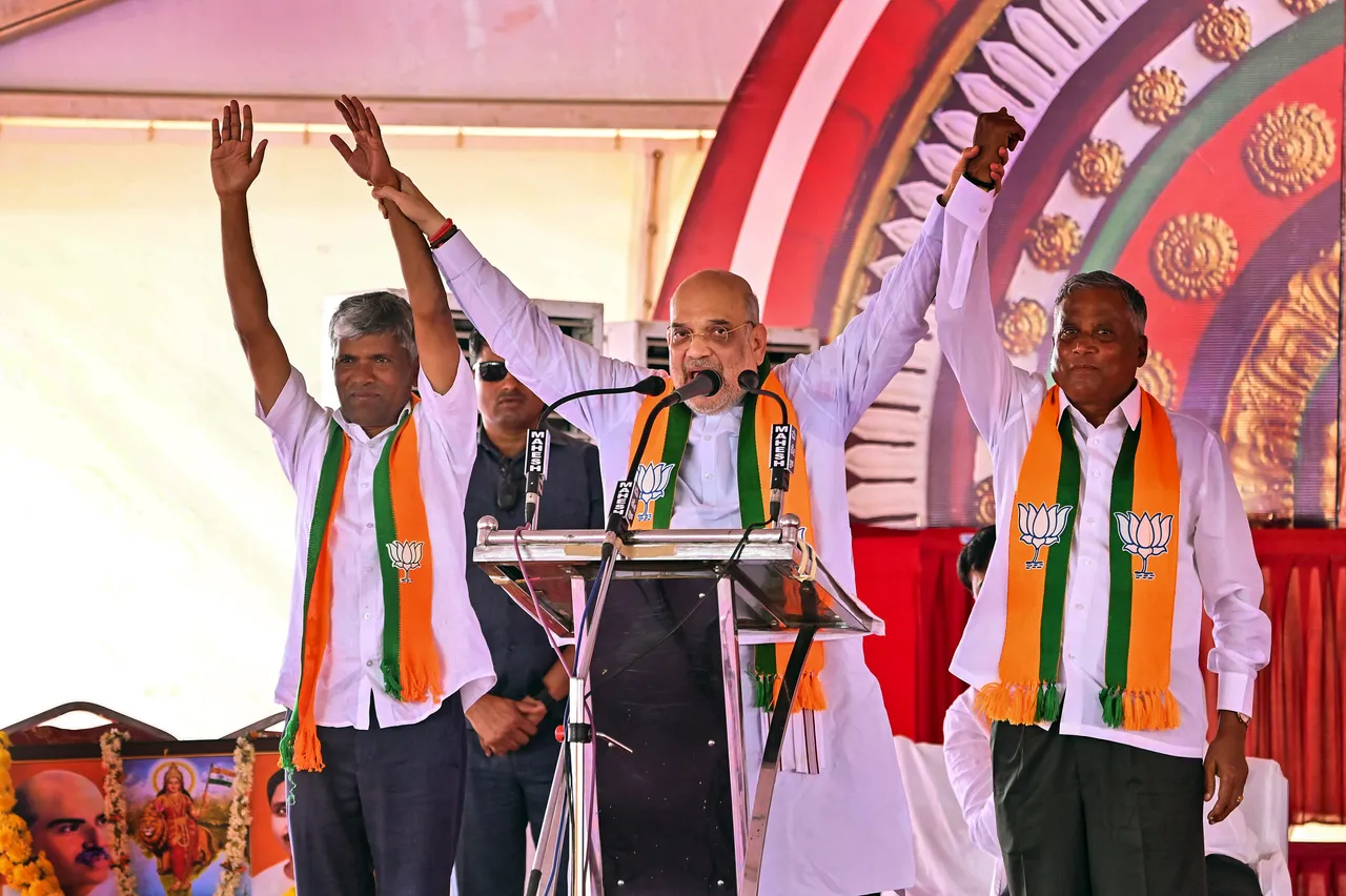 Union Home Minister and senior BJP leader Amit Shah addresses during a public meeting for the upcoming Karnataka Assembly elections, in Mysore district