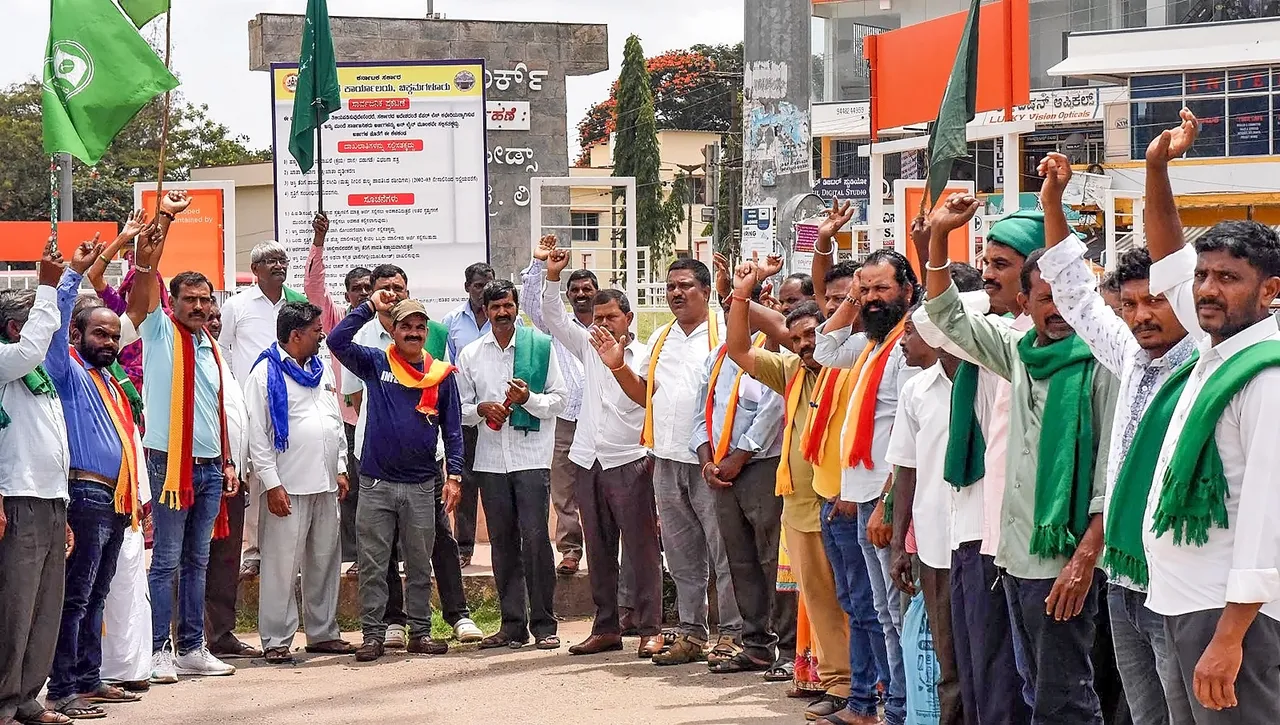 Pro-Kannada activists raise slogans during a protest against Cauvery Water Management Authority (CWMA) over its decision to ensure a flow of 5,000 cusecs of river water to Tamil Nadu till Sept. 29