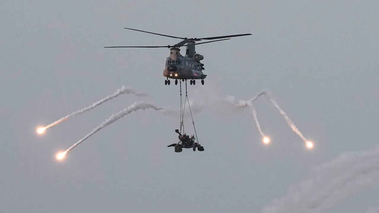 An Indian Air Force (IAF) chopper during a fire power demonstration at the Vayu Shakti 2024 at Pokhran Range, in Jaisalmer district, Saturday, Feb. 17, 2024.