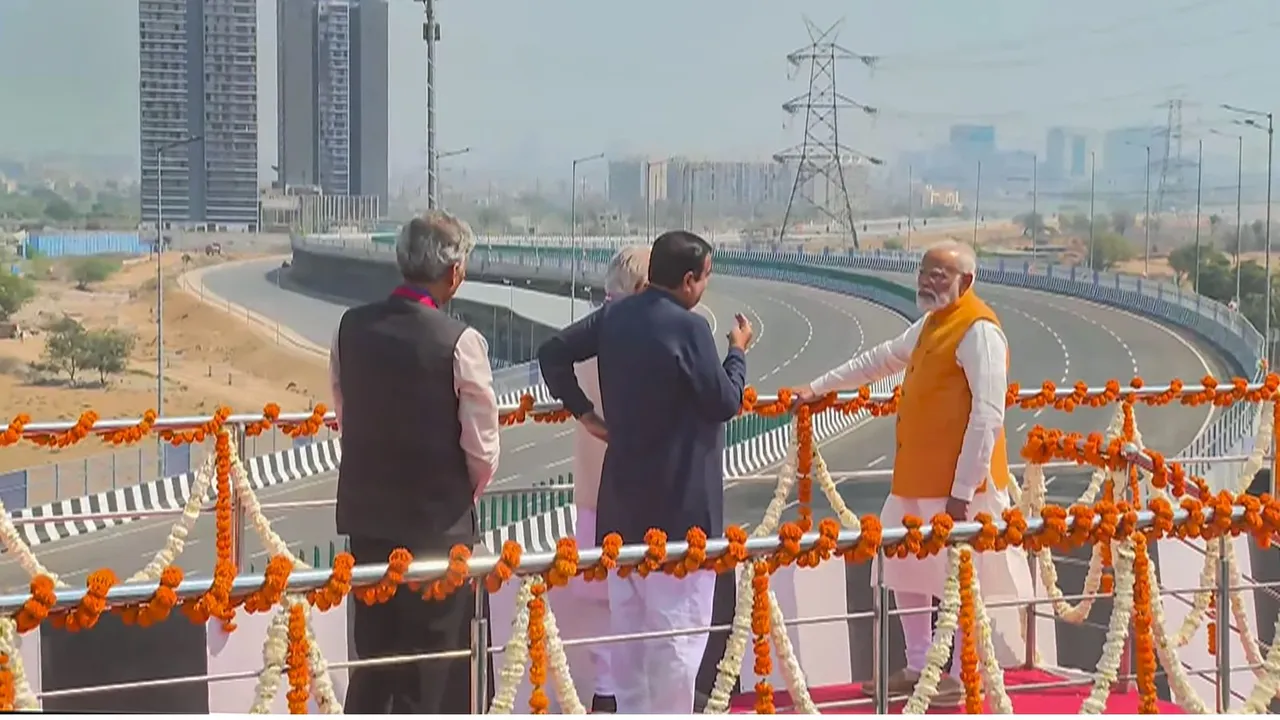 Prime Minister Narendra Modi with Union Minister Nitin Gadkari inspects the 4 Level-Interchange of the Haryana Section of the Dwarka Expressway during its inauguration, in New Delhi