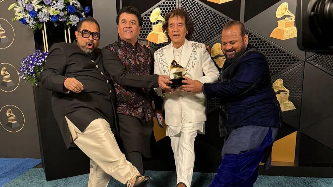 Ustad Zakir Hussain, vocalist Shankar Mahadevan, percussionist V Selvaganesh and violinist Ganesh Rajagopalan of Shakti pose for photos with the award for best global music album for 'This Moment' during the 66th annual Grammy Awards, in Los Angeles on Sunday, Feb. 4, 2024.