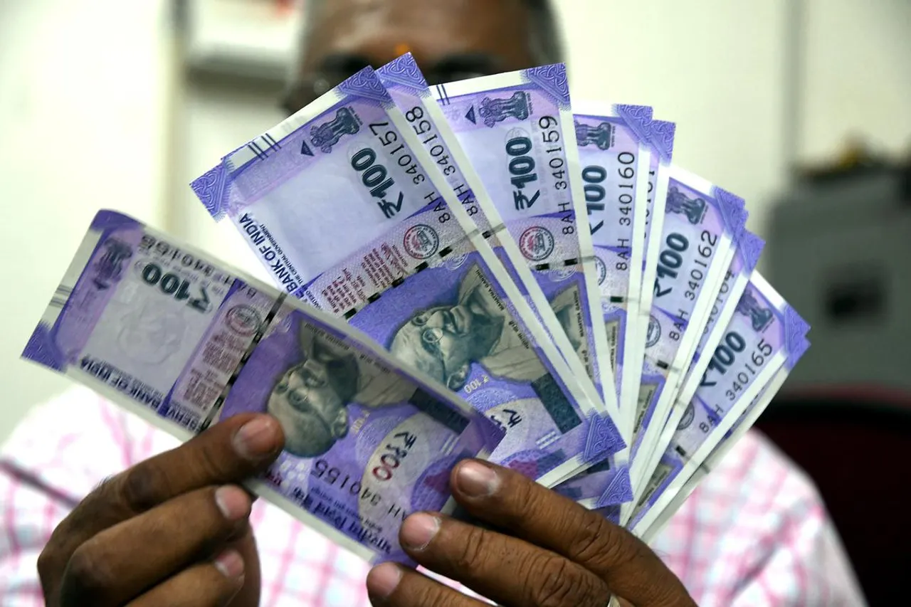 Rupee vs dollar 100 Rupees note