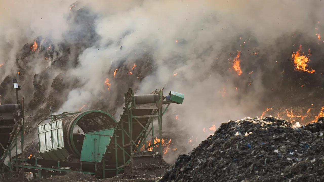 A fire breaks out at the Ghazipur landfill site, in New Delhi, Sunday, April 21, 2024.