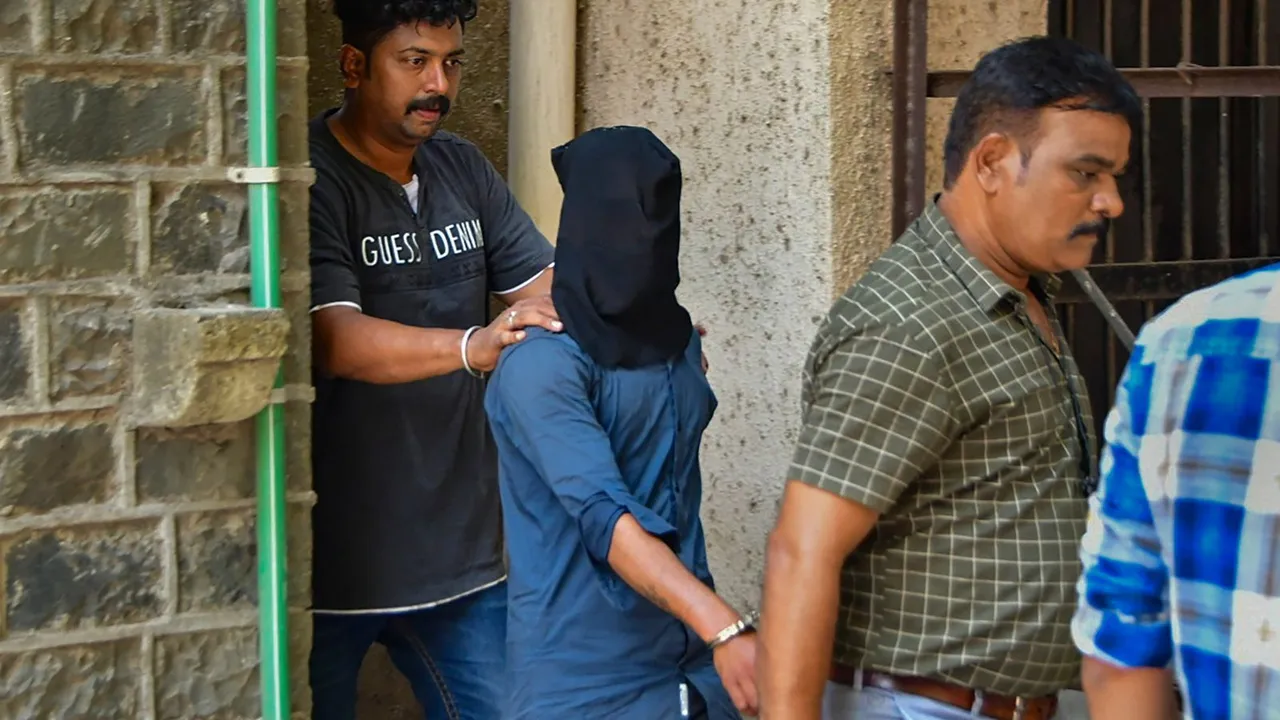 An accused who allegedly opened fire outside Bollywood actor Salman Khan's residence, being brought to Mumbai Police Commissioner office, in Mumbai, Tuesday, April 16, 2024