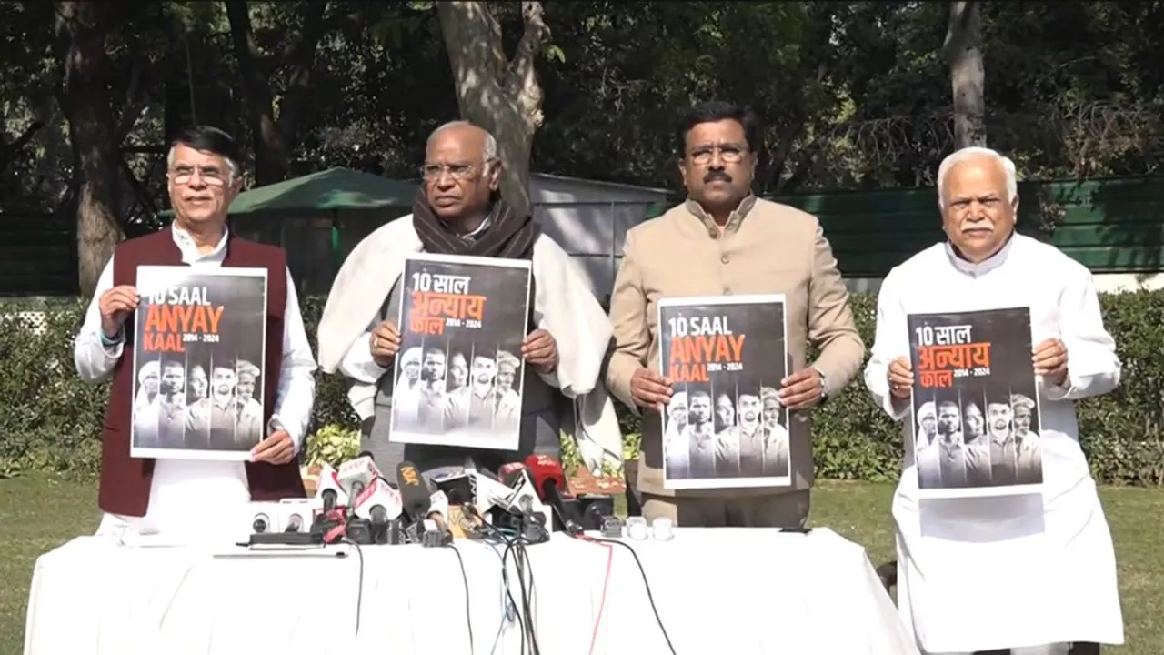Congress President Mallikarjun Kharge with party leader Pawan Khera and other party leaders during a press conference, in New Delhi