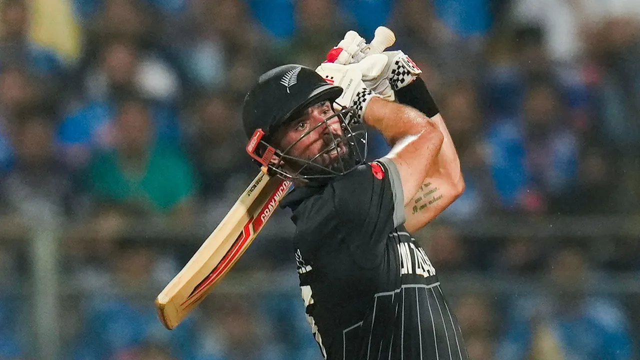 New Zealand's Daryl Mitchell plays a shot during the ICC Men's Cricket World Cup 2023 first semi-final match
