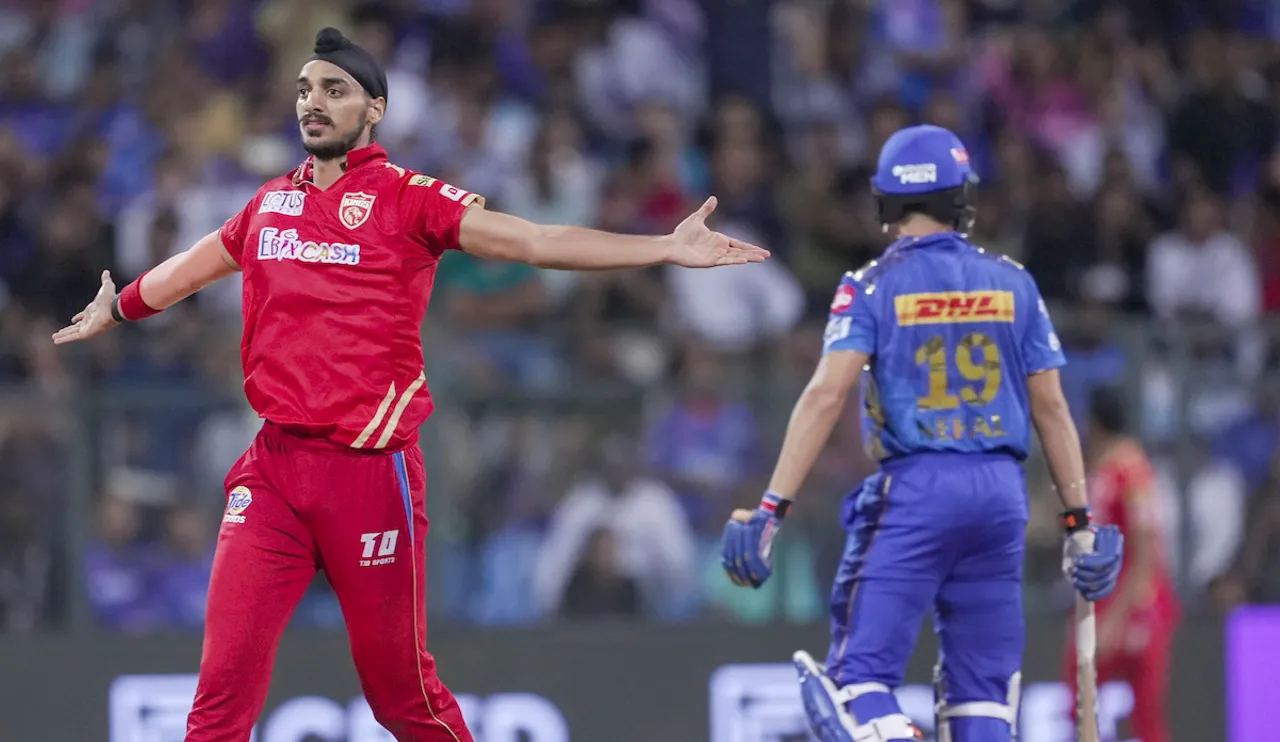 Arshdeep Singh celebrates the wicket of Mumbai Indians batter Nehal Wadhera at Wankhede Stadium on April 22