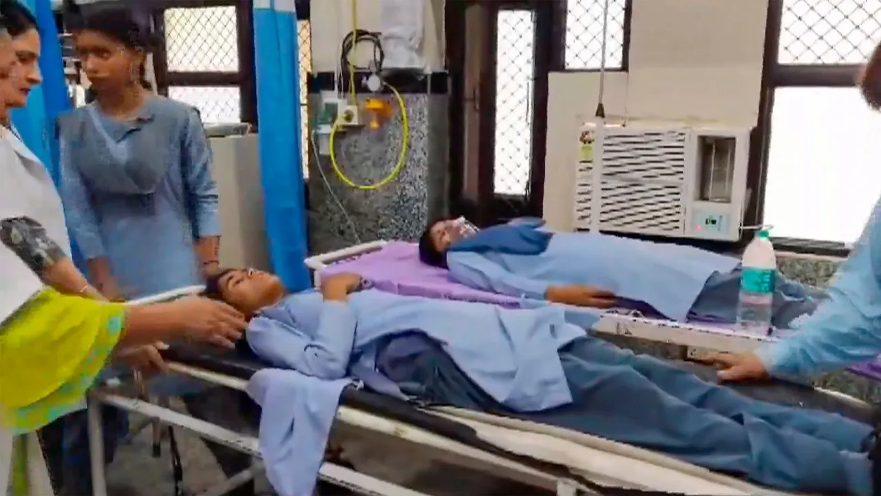 Injured school students being brought for treatment at a hospital after a bus carrying them overturned, at Pinjore in Panchkula district, Monday, July 8, 2024.