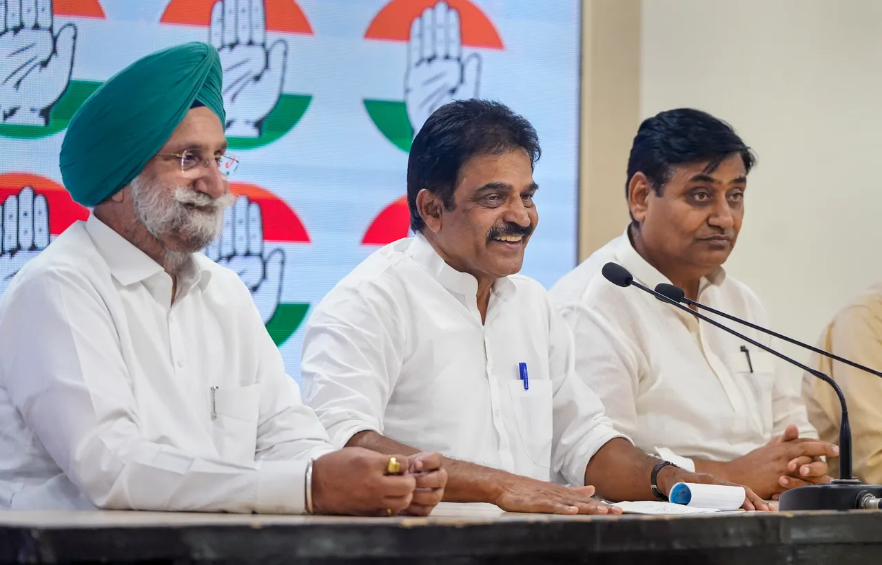 Congress General Secretary KC Venugopal with party leaders Sukhjinder Singh Randhawa and Govind Singh Dotasra addresses a press conference after a strategic meeting on Rajasthan polls, at AICC office in New Delhi