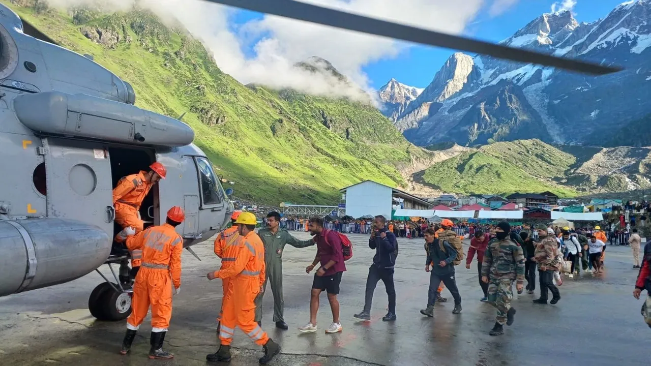 NDRF and IAF personnel conduct a rescue operation at Gaucher following the cloudburst in Uttarakhand.