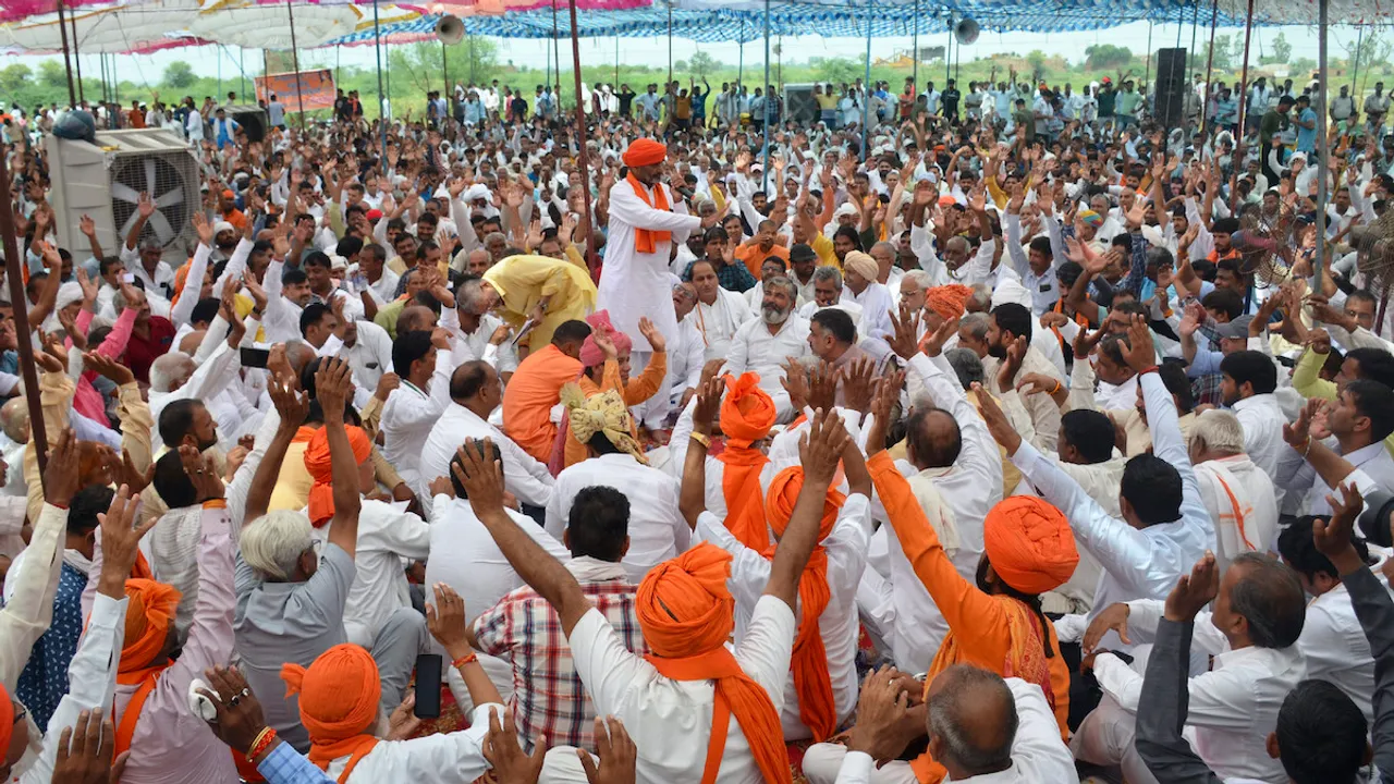 People attend a 'Mahapanchayat' called by Hindu outfits, at Pondri village in Palwal District, Sunday, Aug. 13, 2023.