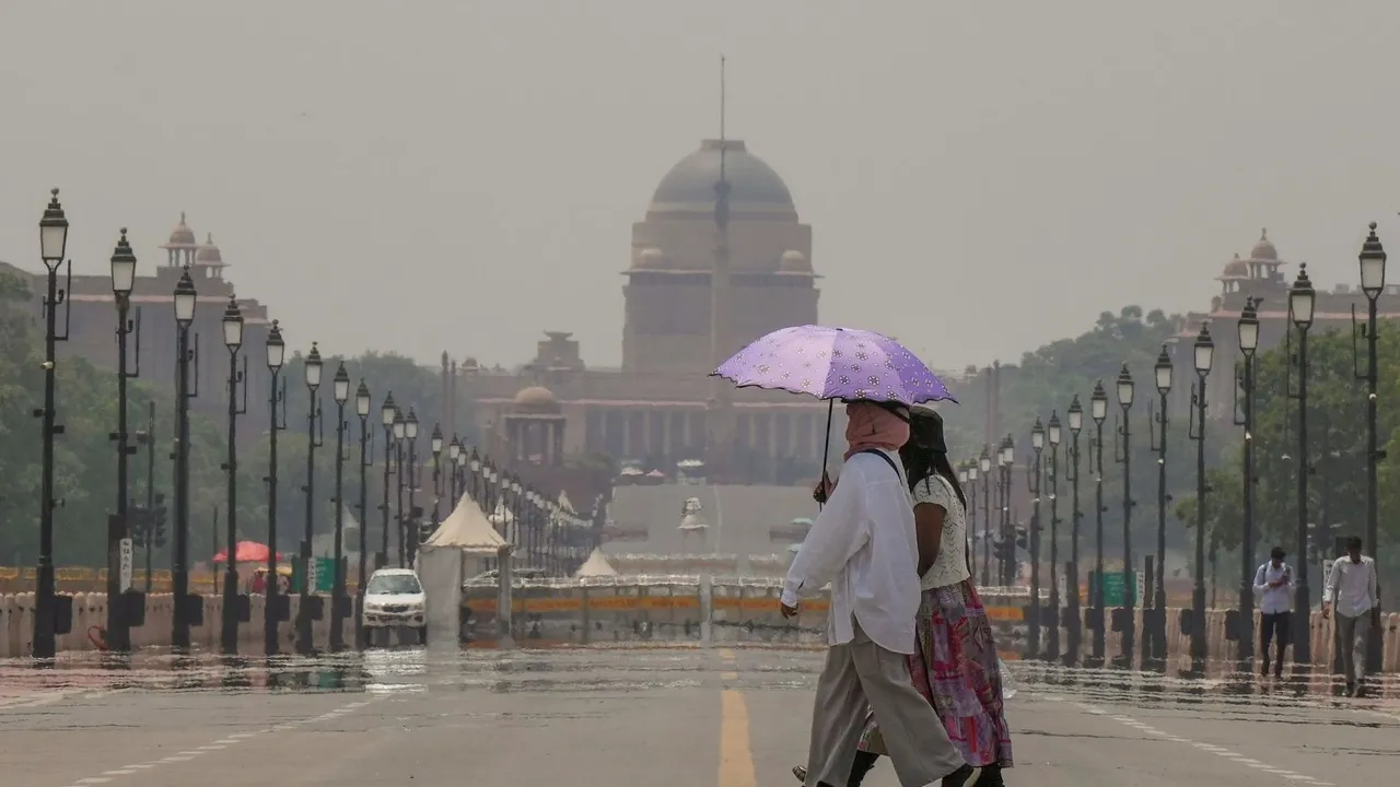 Visitors walk on Kartvya Path as a mirage appears on a hot summer day, in New Delhi, Sunday, May 5, 2024