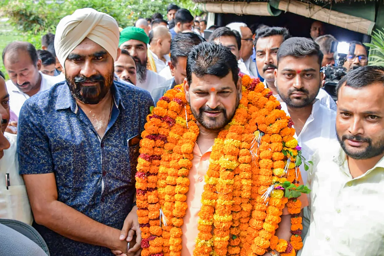 Wrestling Federation of India (WFI) chief Brij Bhushan Singh during an interaction with the media at his residence in Bishnoharpur village, in Gonda