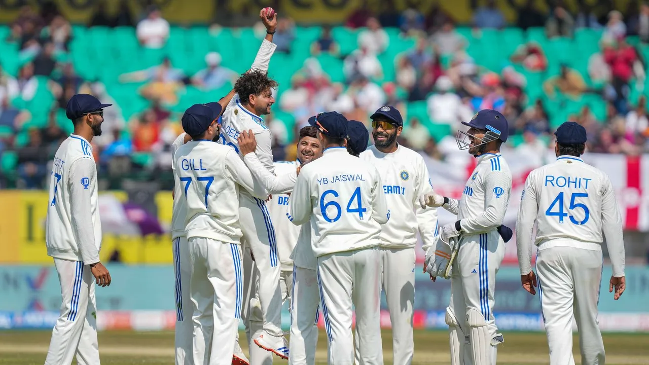 India's bowler Kuldeep Yadav celebrates after taking five wickets during the first day of the fifth Test cricket match between India and England, in Dharamshala