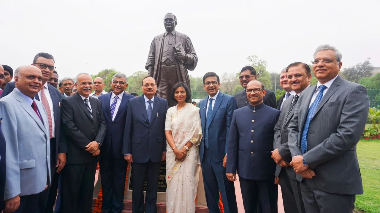 Chief Justice of India DY Chandrachud with wife Kalpana Das, Chief Justice of Singapore Sundaresh Menon and others after paying tribute to BR Ambedkar, at the Supreme Court, in New Delhi, Sunday, April 14, 2024