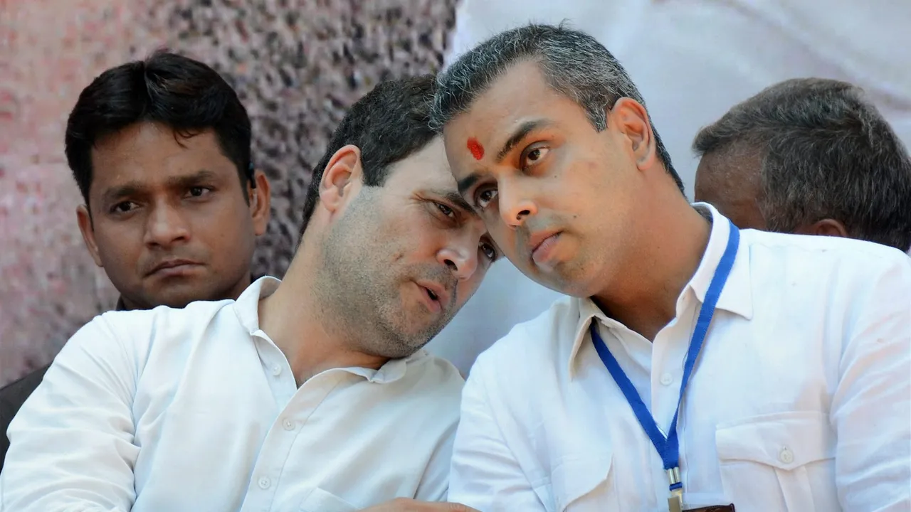 In this Tuesday, April 12, 2016 file photo, then Congress Vice President Rahul Gandhi with Milind Deora in Mumbai
