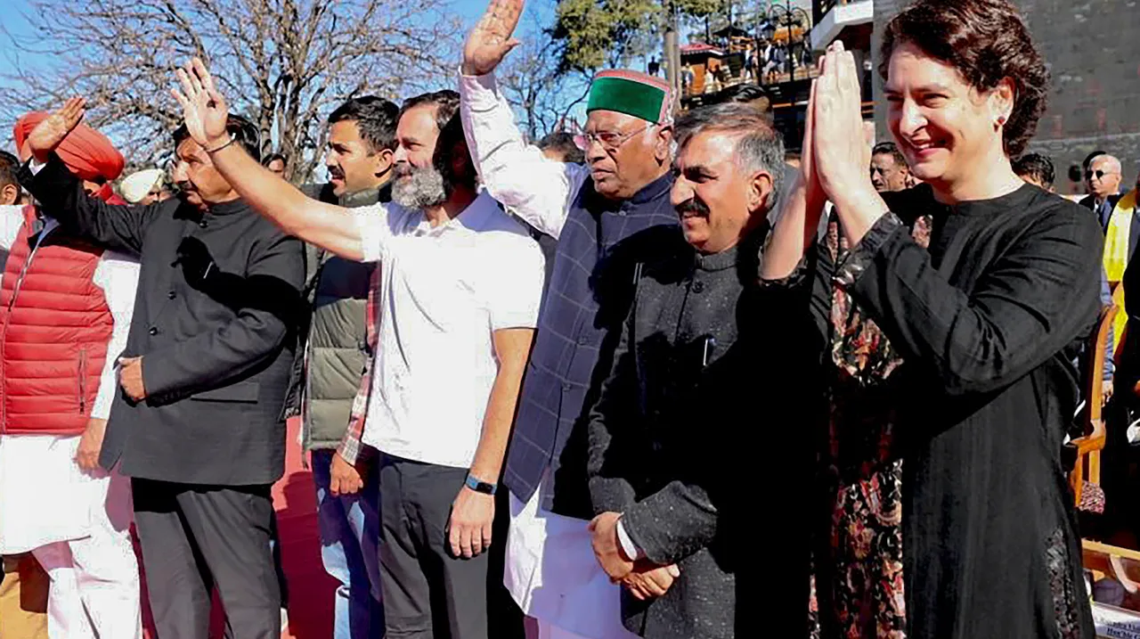 Himachal Pradesh Chief Minister Sukhwinder Singh Sukhu (2nd R) and his deputy Mukesh Agnihotri (2nd L) with Congress President Mallikarjun Kharge, party leaders Rahul Gandhi, Priyanka Gandhi Vadra and others at the swearing-in ceremony, in Shimla, Sunday