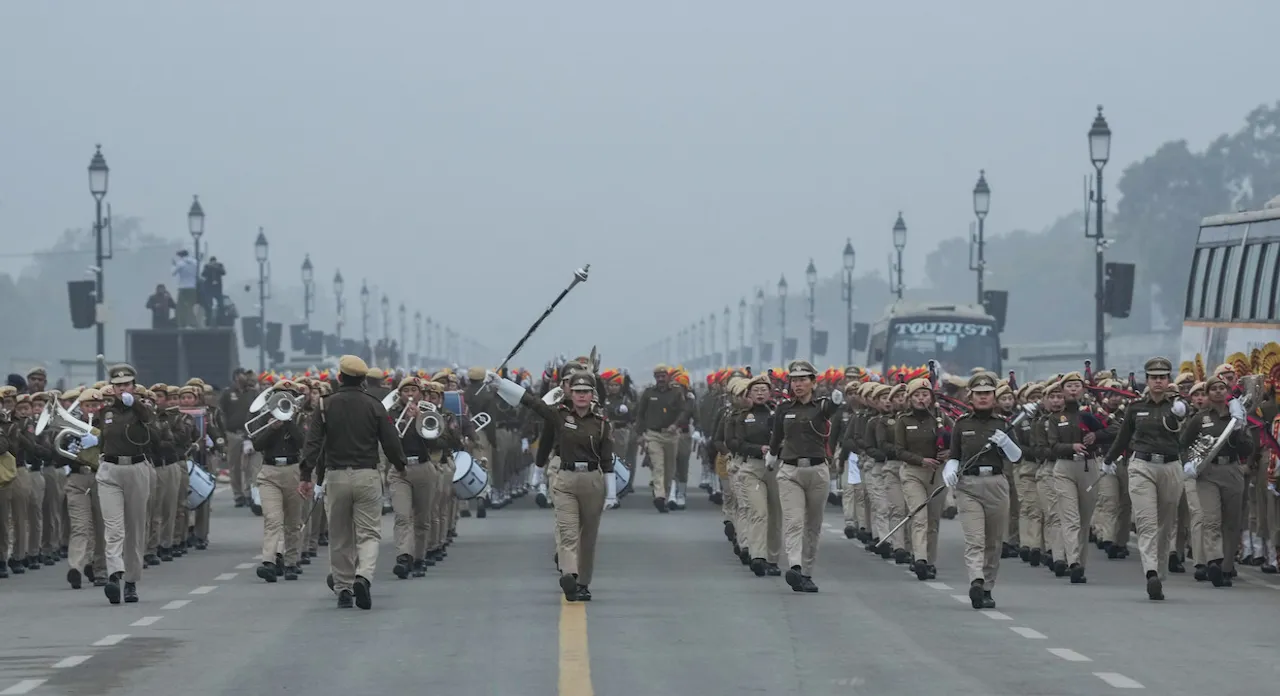 Delhi Police personnel during rehearsals for the upcoming Republic Day parade amid fog on a cold winter morning, in New Delhi, Wednesday, Jan. 10, 2024.