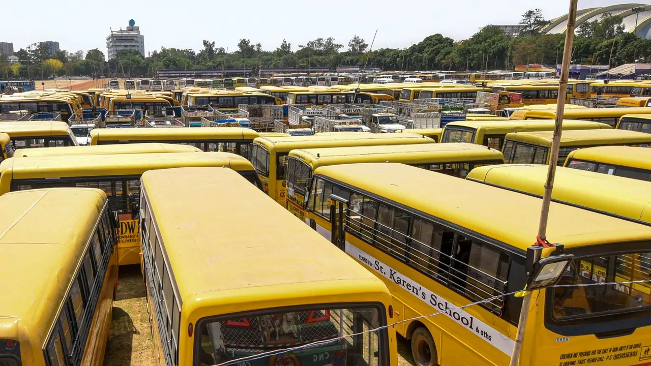 Vehicles requisitioned for the last phase of voting for Lok Sabha elections stand parked at Gandhi Maidan, in Patna, Tuesday, May 28, 2024