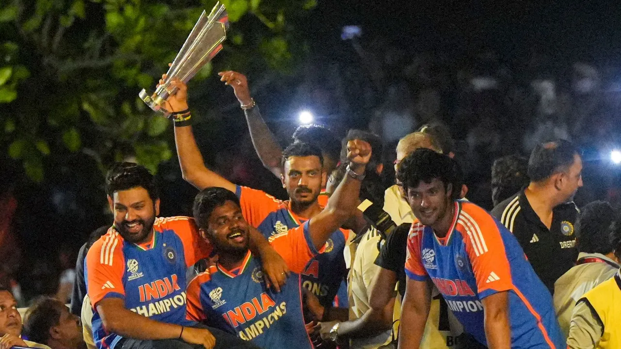 The T20 World Cup-winning Indian cricket team captain Rohit Sharma with players Sanju Samson, Axar Patel, Shivam Dube and others during their open bus victory parade, in Mumbai, Thursday, July 4, 2024.