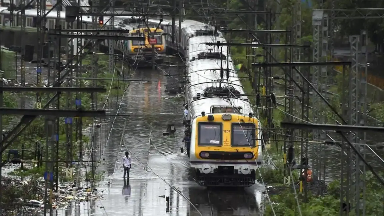 Heavy rain in parts of Mumbai amid 'orange' alert; trains services hit