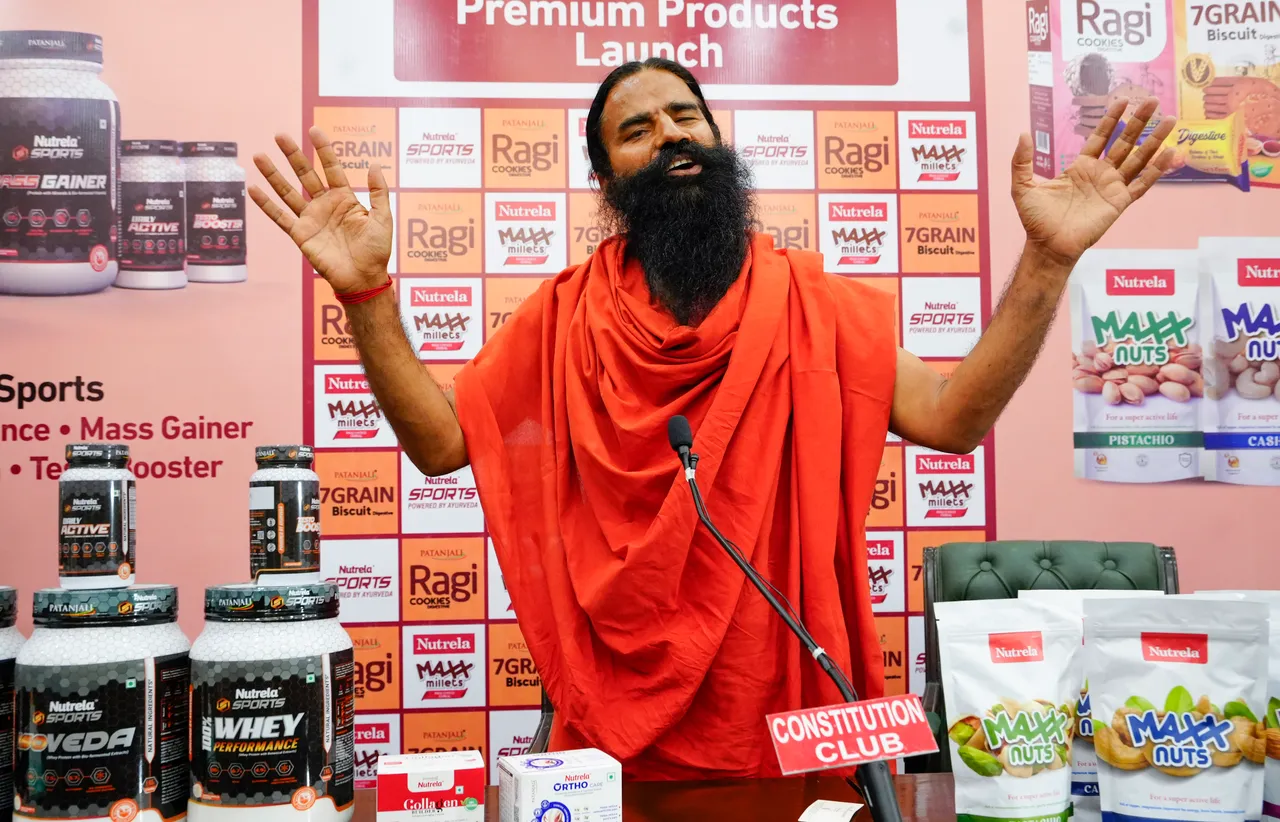 Yoga guru Baba Ramdev speaks with the media during a press conference for the launch of Patanjali Foods Limited's Nutrela Sports range and other premium products, in New Delhi