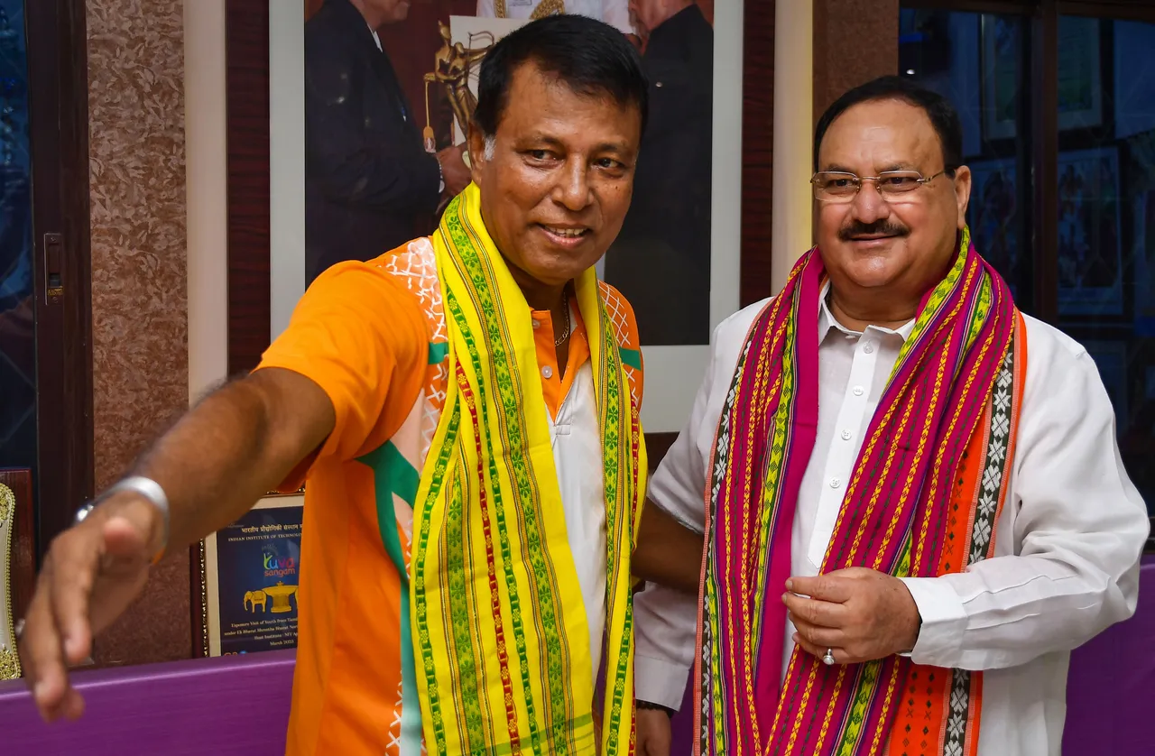 BJP National President JP Nadda meets Dronacharya Awardee gymnast Bishweshwar Nandi as part of the 'Sampark Se Samarthan' campaign, in Agartala