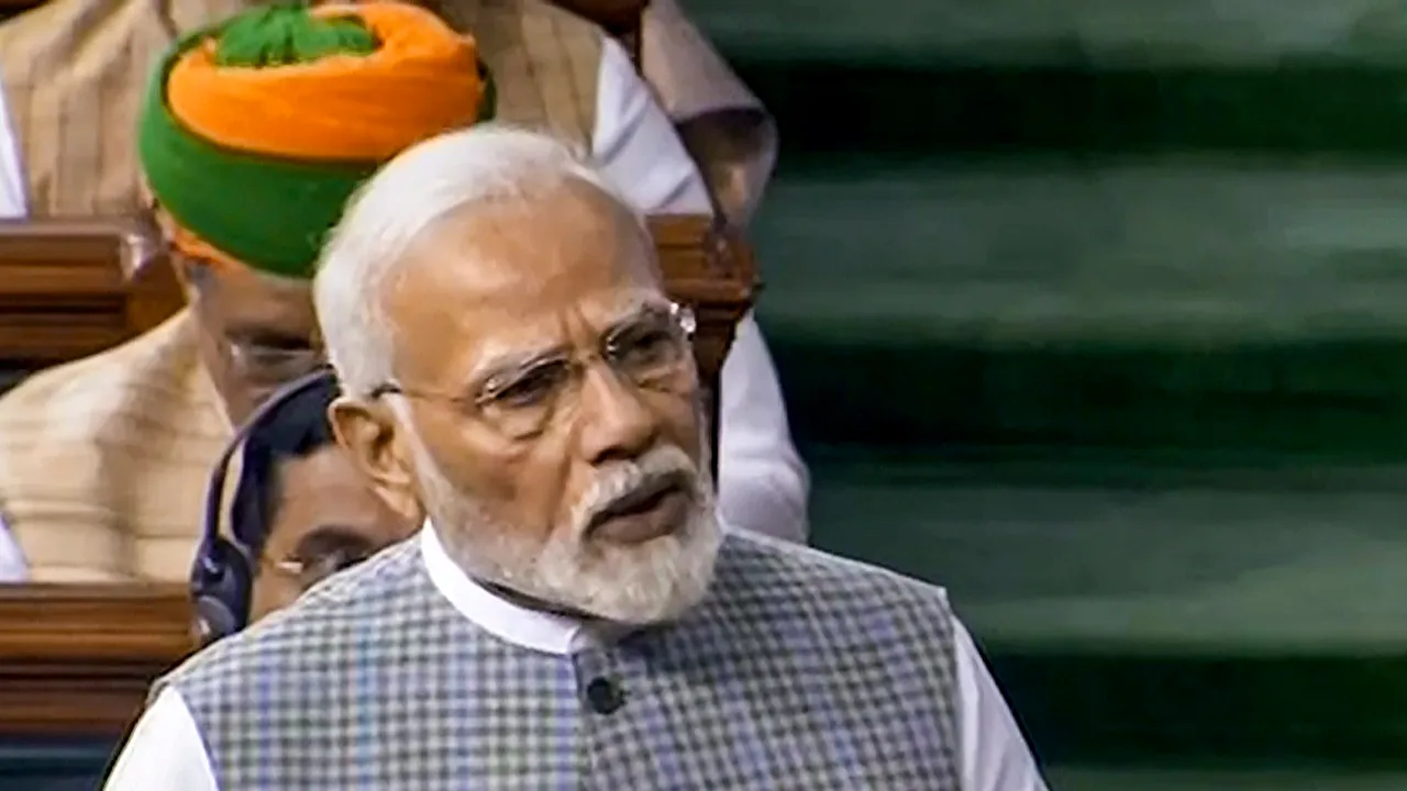 Prime Minister Narendra Modi speaks in the Lok Sabha during a special session of Parliament, in New Delhi