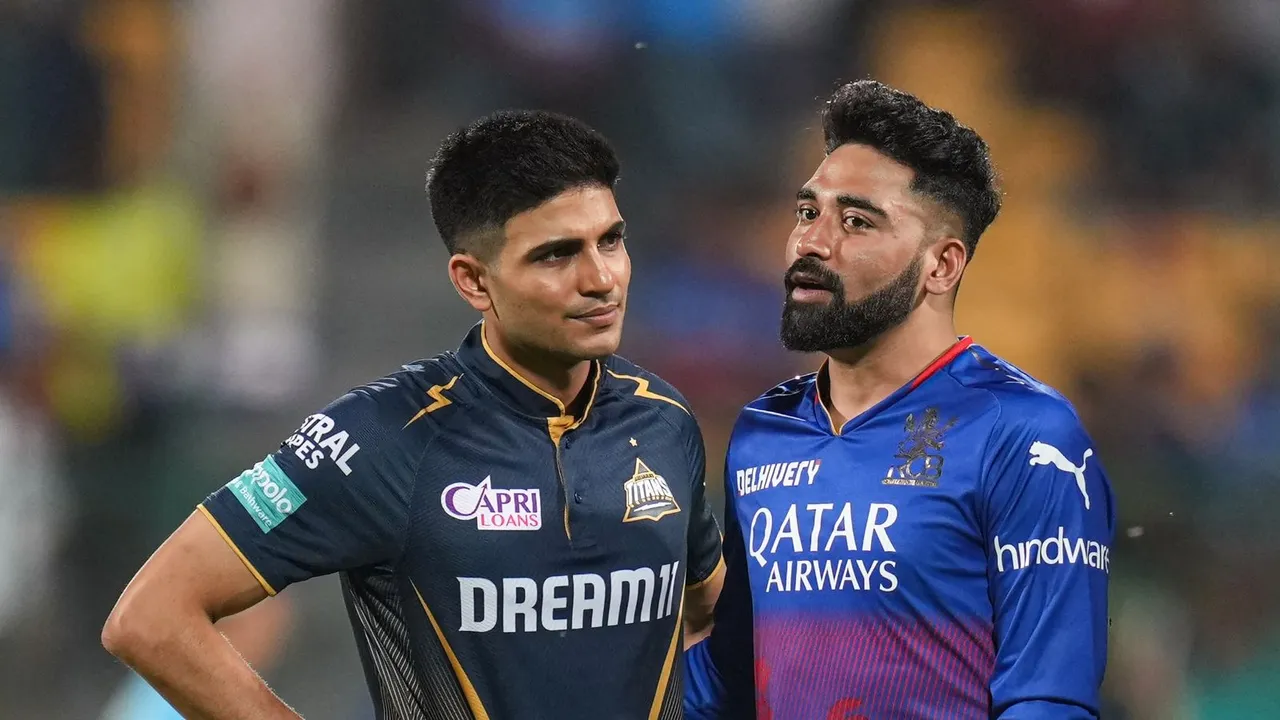 Royal Challengers Bengaluru player Mohammed Siraj and Gujrat Titans's Shubman Gill before the start of the Indian Premier League (IPL) 2024 T20 cricket match between Royal Challengers Bangalore and Gujrat Titans