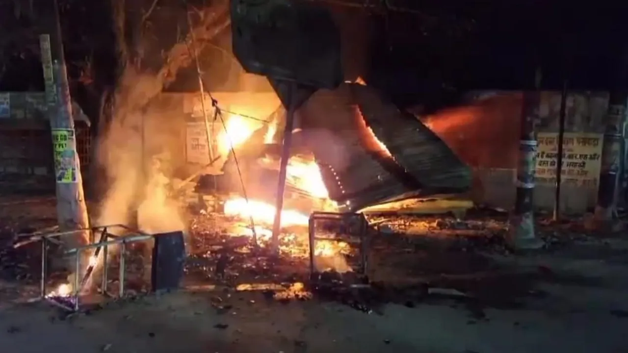 A structure set on fire by angered people after a barber allegedly killed two boys, in Budaun, Tuesday night, March 19, 2024.