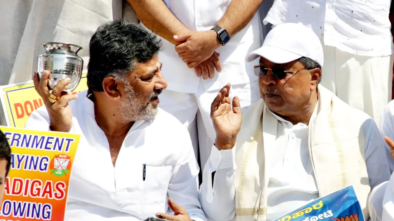 Karnataka Chief Minister Siddaramaiah and Deputy Chief Minister D.K. Shivakumar during a protest against the central government over the release of drought relief to Karnataka, in Bengaluru, Sunday, April 28, 2024