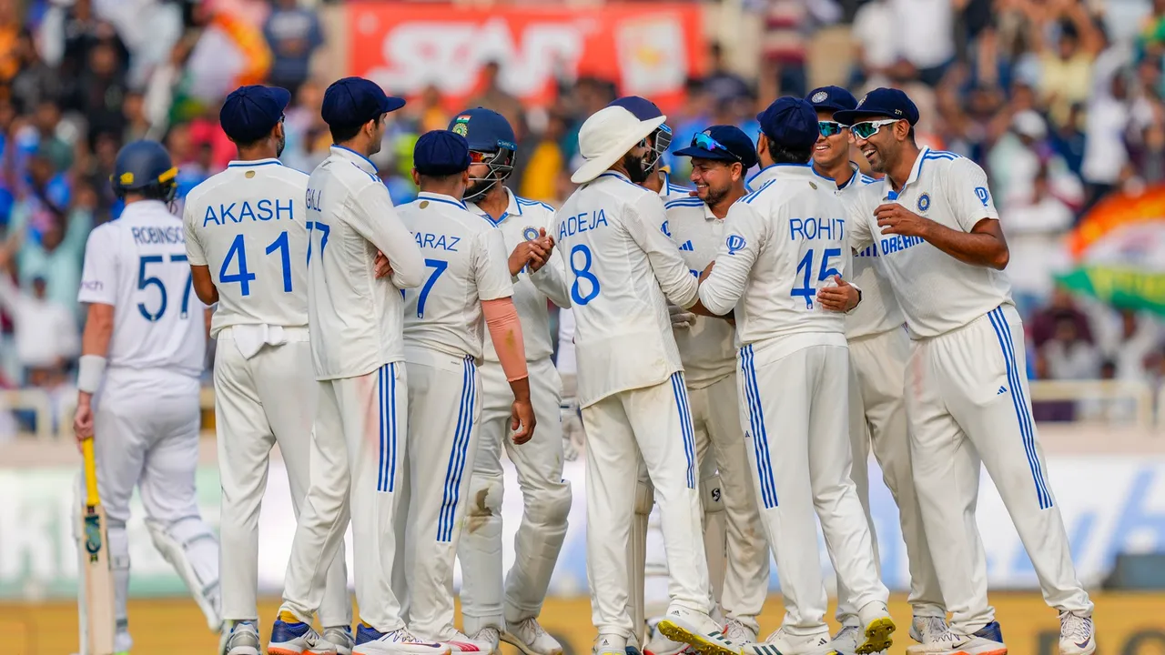 India's Kuldeep Yadav with teammates celebrates the dismissal of England's Ollie Robinson during the third day of the fourth Test cricket match