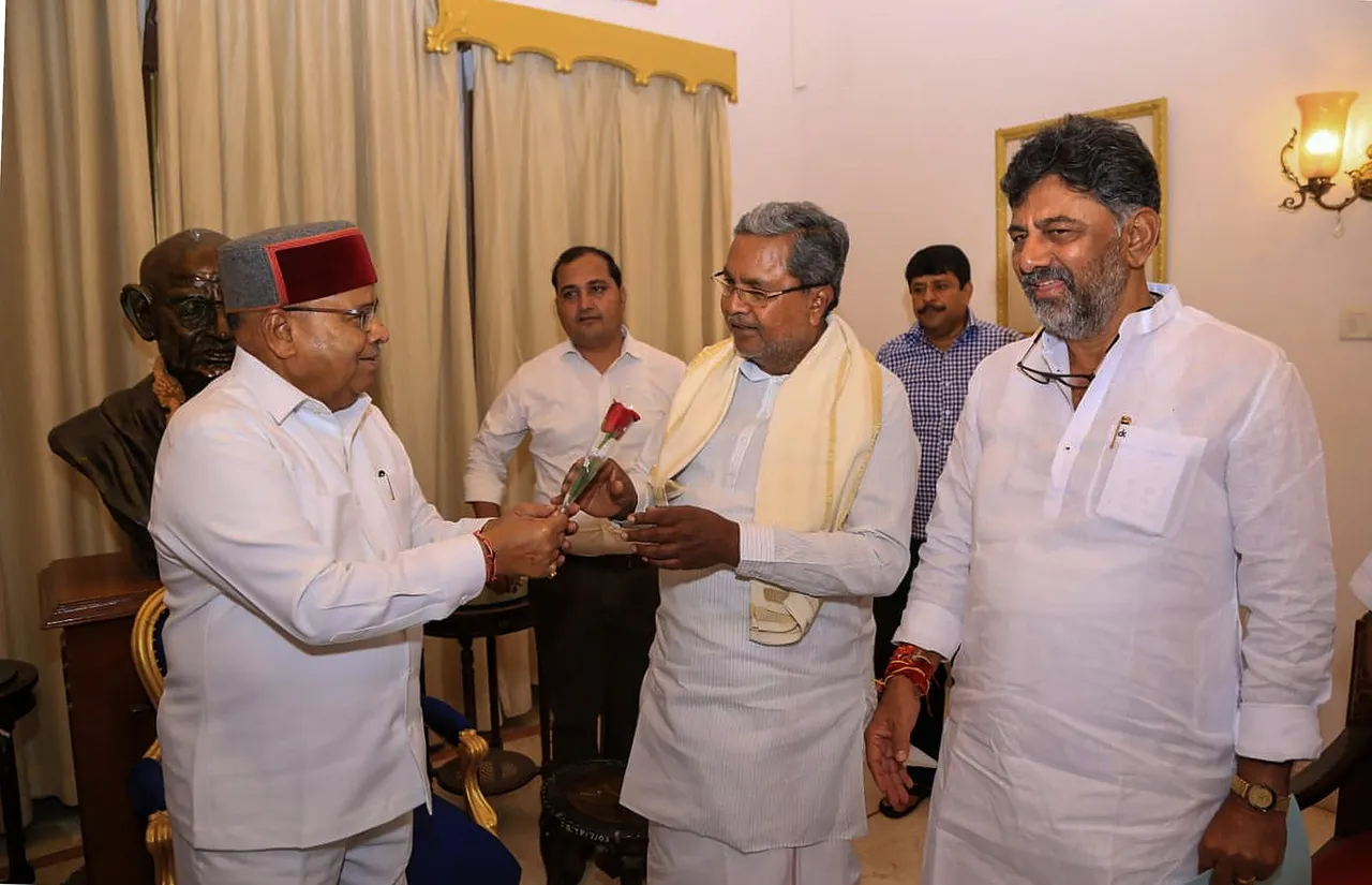 Karnataka CM-designate Siddaramaiah with his deputy D K Shivakumar meets Karnataka Governor Thaawarchand Gehlot to stake claim to form the government in the state, at Raj Bhavan in Bengaluru,