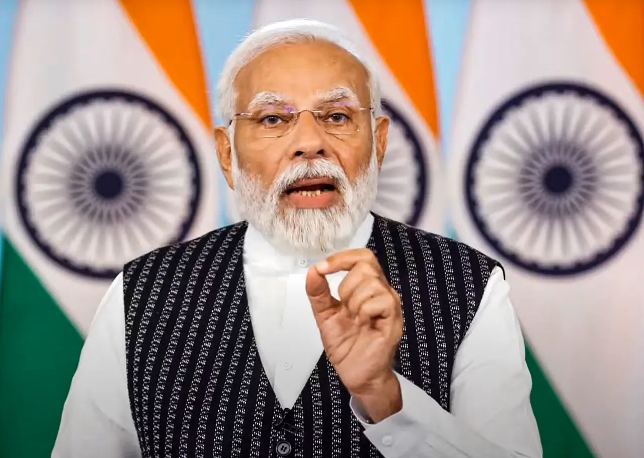 Prime Minister Narendra Modi addresses an event to distribute about 70,000 appointment letters to newly inducted recruits via video conferencing, in New Delhi