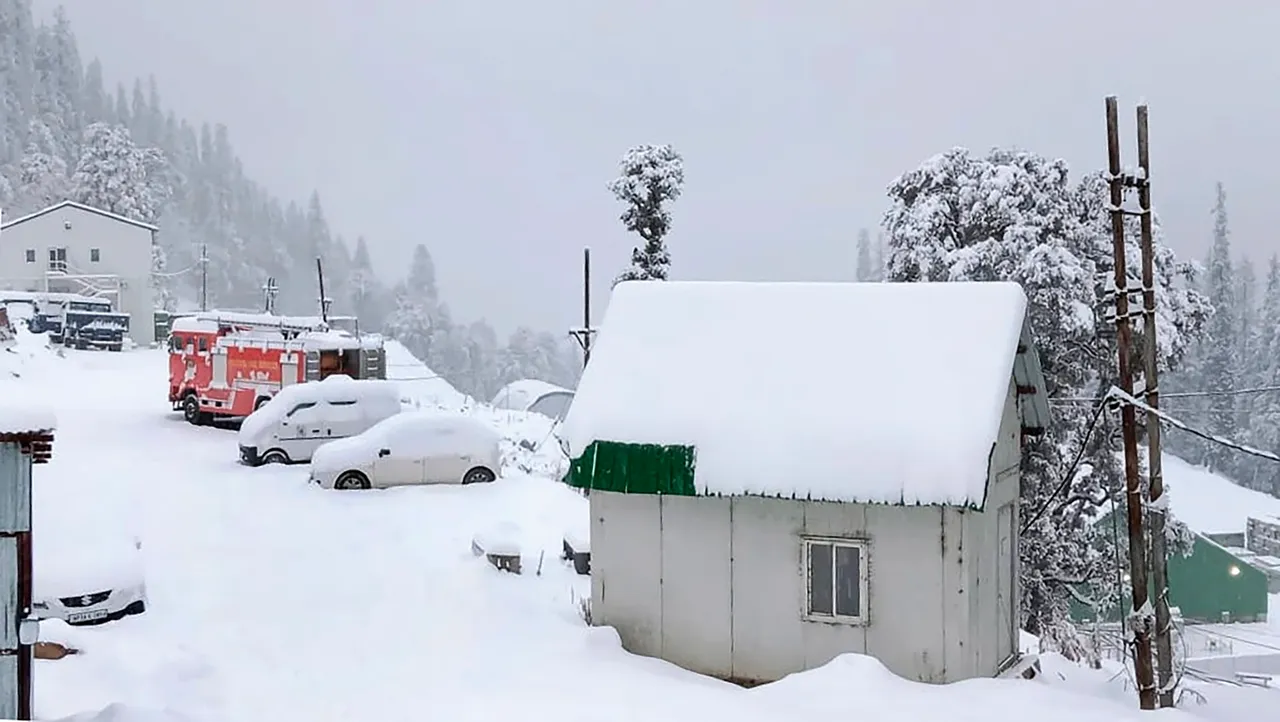 Roads and vehicles covered in snow after fresh snowfall at Atal Tunnel, in Manali, Wednesday, Jan. 31, 2024.