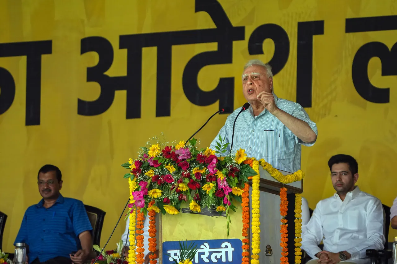 Rajya Sabha MP Kapil Sibal addresses AAP's maha rally against the Centre's ordinance on control of services in the national capital, at Ramlila Maidan, in New Delhi