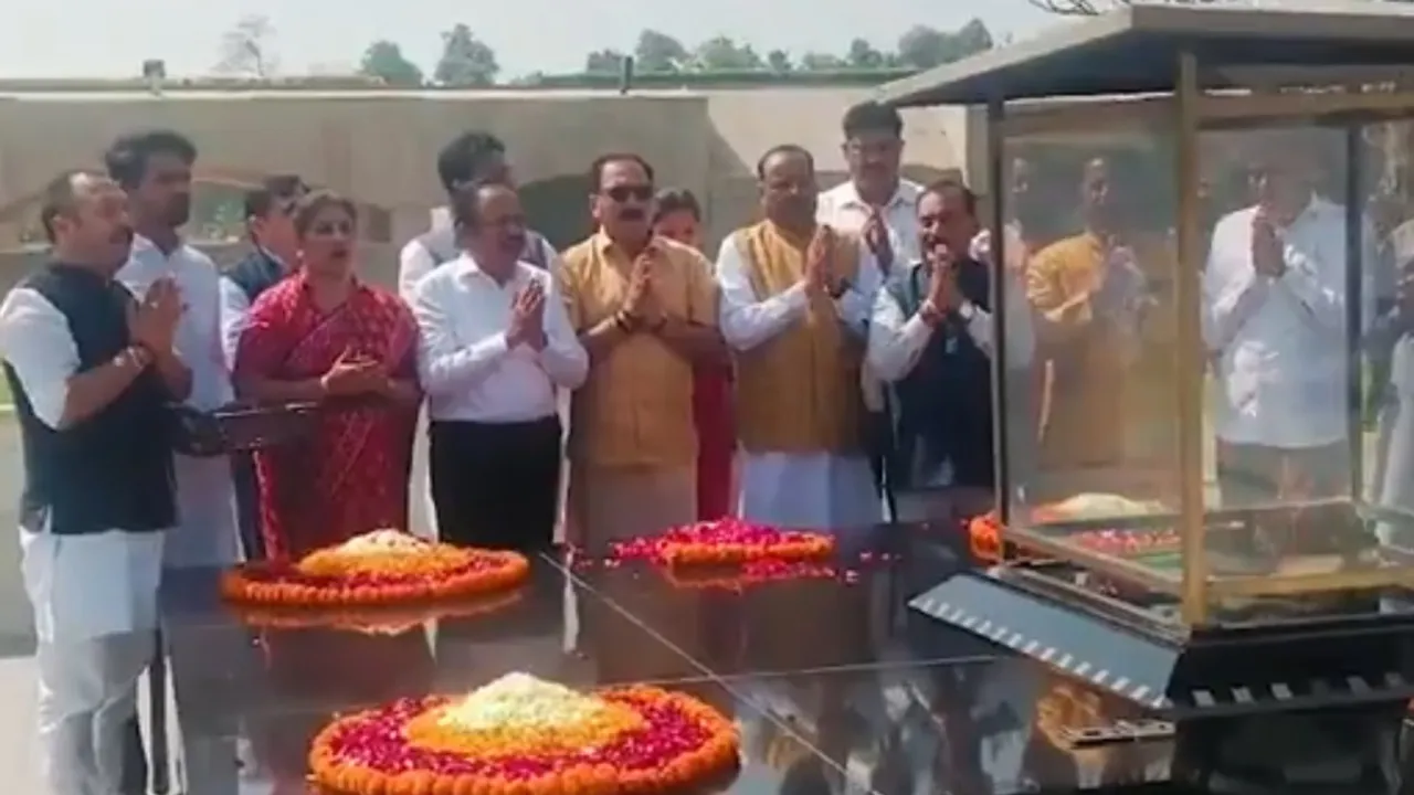 Delhi BJP President Virendra Sachdeva along with other senior leaders pay floral tributes to Mahatma Gandhi at Rajghat