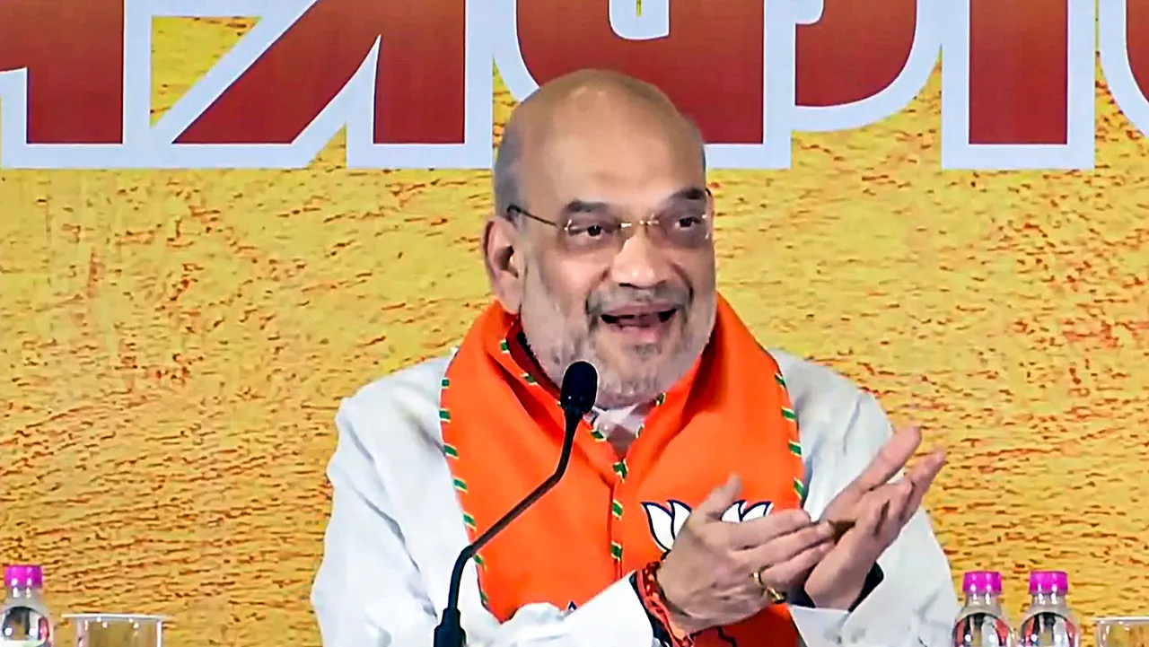 Union Home Minister Amit Shah addresses a press conference ahead of Rajasthan Assembly elections, in Jaipur