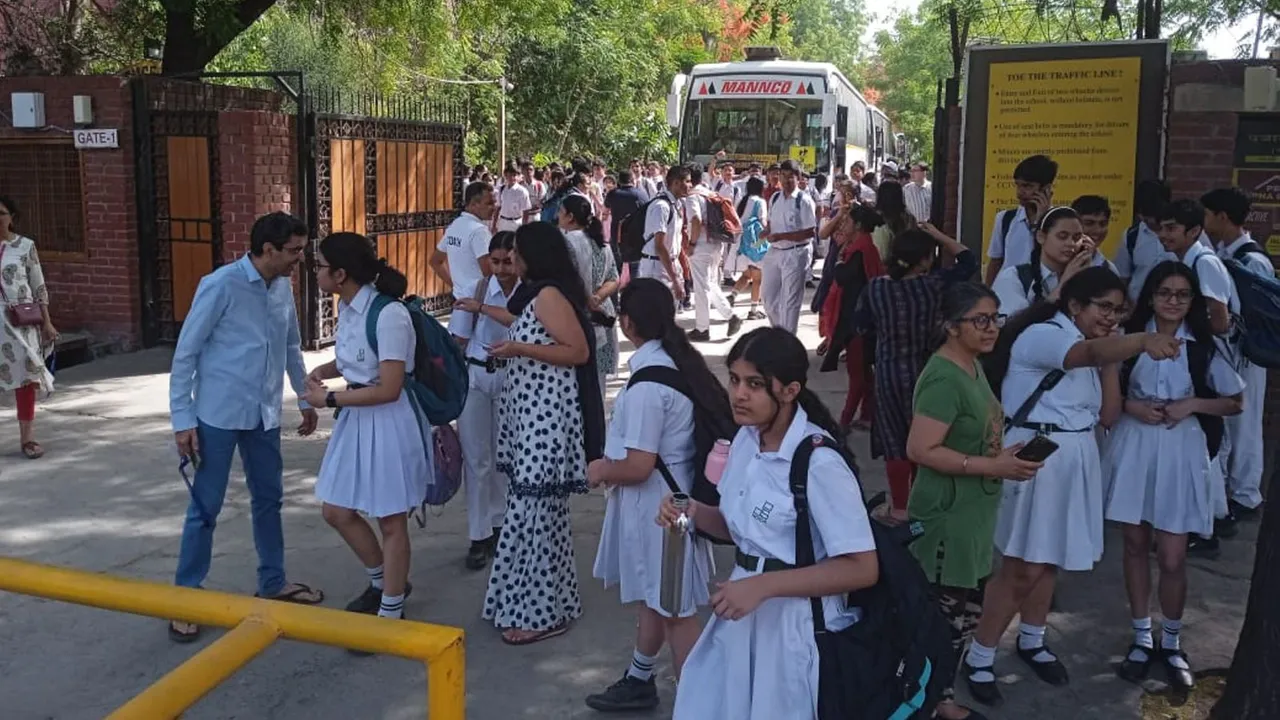 Students and parents outside Delhi Public School, Noida, after several schools received a bomb threat, in Noida, Wednesday, May 1, 2024