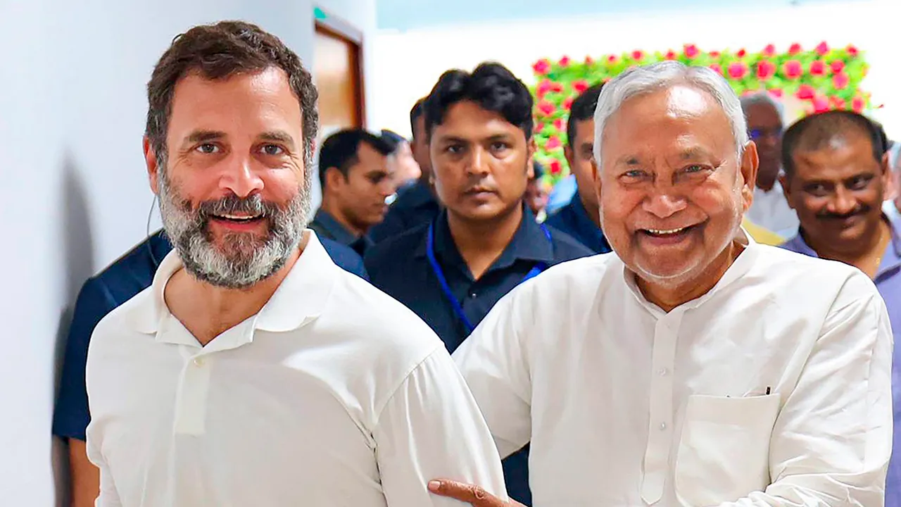 In this Friday, June 23, 2023 image Bihar CM and JD-U chief Nitish Kumar with Congress leader Rahul Gandhi attends the opposition parties' meeting, in Patna