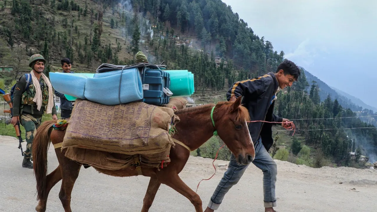 Security personnel and polling officials transport EVMs and other election material for the first phase of voting for Lok Sabha elections, at Dusra Village in Doda, Thursday, April 18, 2024