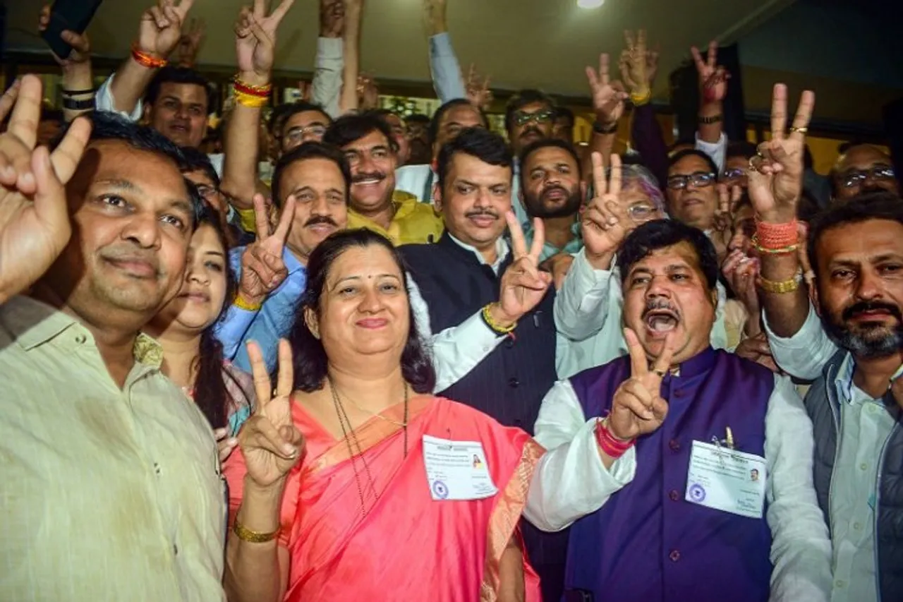 BJP members showing victory sign after conclusion of Maharashtra's legislative council election, on Monday
